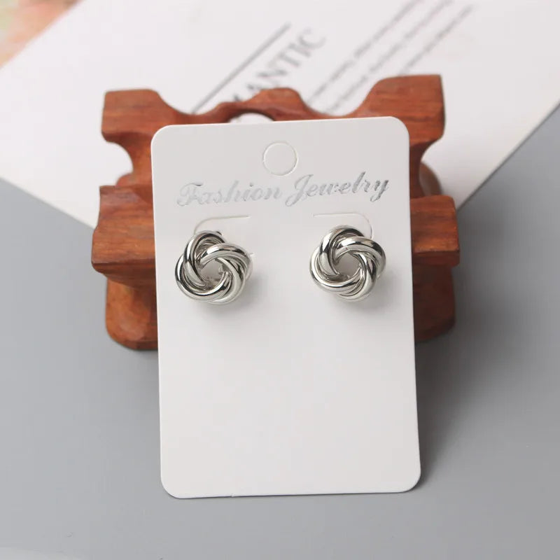 Panqureli® Kleine goldfarbene Metall-Ohrstecker für Damen mit gedrehtem rundem Design – außergewöhnlicher Modeschmuck