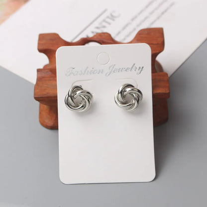 Panqureli® Kleine goldfarbene Metall-Ohrstecker für Damen mit gedrehtem rundem Design – außergewöhnlicher Modeschmuck
