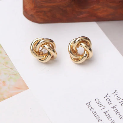 Panqureli® Kleine goldfarbene Metall-Ohrstecker für Damen mit gedrehtem rundem Design – außergewöhnlicher Modeschmuck