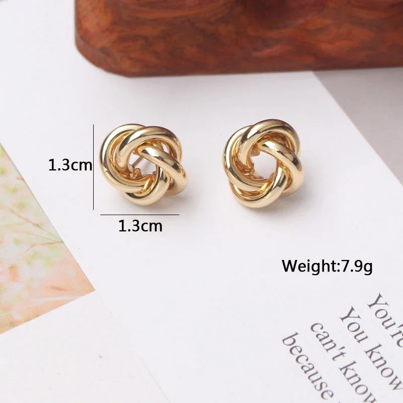 Panqureli® Kleine goldfarbene Metall-Ohrstecker für Damen mit gedrehtem rundem Design – außergewöhnlicher Modeschmuck