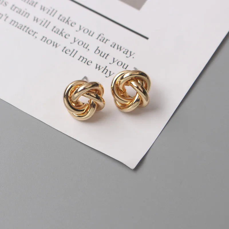 Panqureli® Kleine goldfarbene Metall-Ohrstecker für Damen mit gedrehtem rundem Design – außergewöhnlicher Modeschmuck
