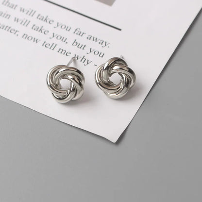 Panqureli® Kleine goldfarbene Metall-Ohrstecker für Damen mit gedrehtem rundem Design – außergewöhnlicher Modeschmuck