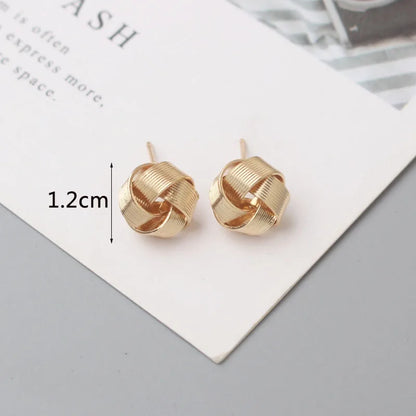 Panqureli® Kleine goldfarbene Metall-Ohrstecker für Damen mit gedrehtem rundem Design – außergewöhnlicher Modeschmuck